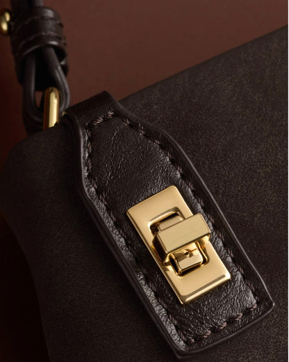 Katie Loxton | Bitter Chocolate Orin Twist Lock Suedette Small Shoulder Bag